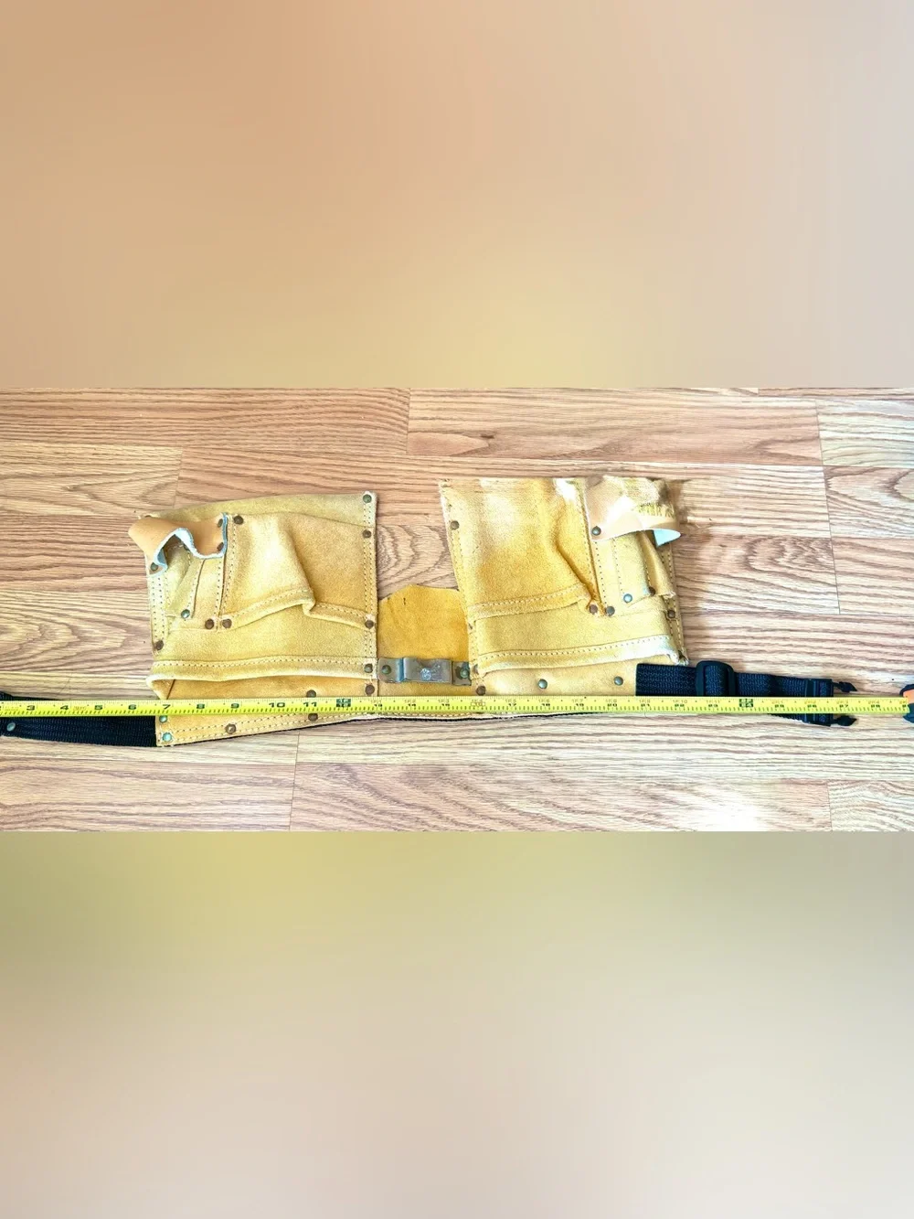 Suede leather Tool-belt that says ”Daddy Helper”n large gold letters in front.